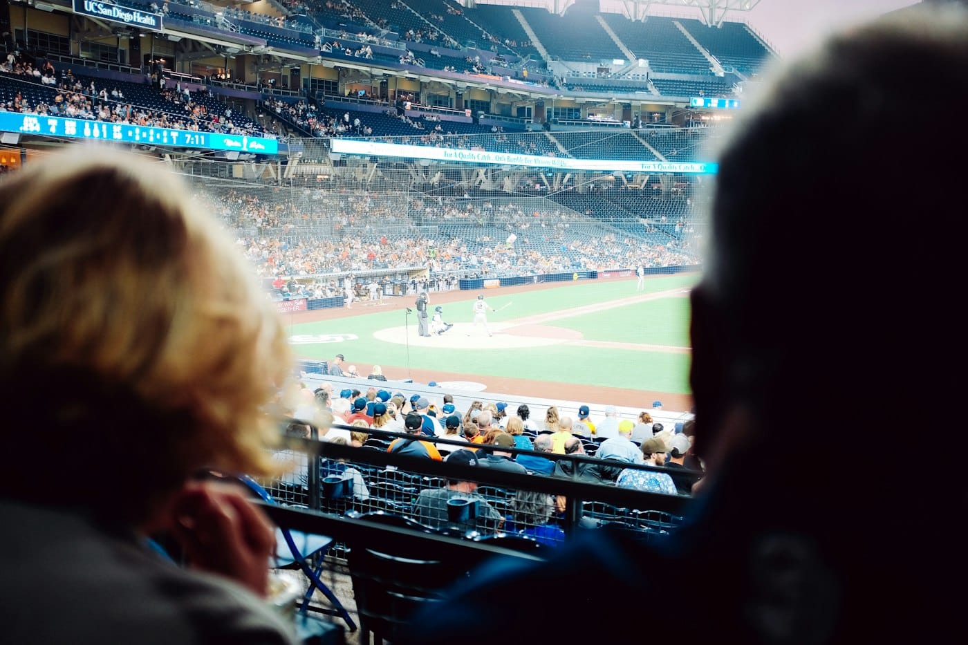 people watching on stadium during daytime