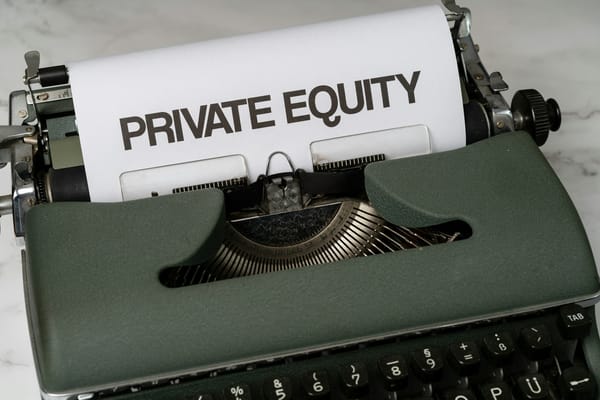 a close up of a typewriter with a paper that reads private equity