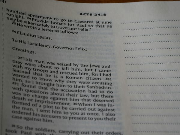 A close up of an open book on a table